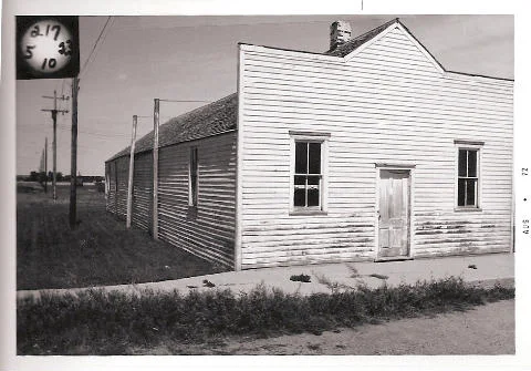 Historic white building in Grand Rapids, ND