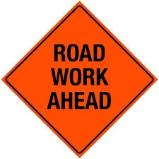 Orange Road work ahead sign